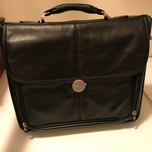 Dell laptop and office briefcase 💼
